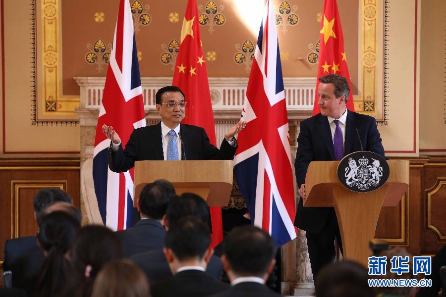 6月17日，國務(wù)院總理李克強(qiáng)同英國首相卡梅倫在倫敦舉行中英總理年度會(huì)晤后共同會(huì)見記者。新華社記者 龐興雷 攝
